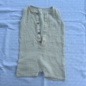 Oat Co. muslin romper in the color ecru